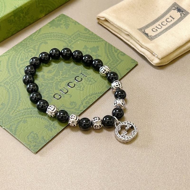 G*u*i bracelets